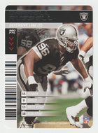 Darrell Russell - Oakland Raiders (NFL Football Card) 2001 Showdown - 2002 1st Edition # 321 Mint