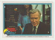 Devon Miles Considering The Case - Knight Rider (Trading Card) # 8 - 1983 Donruss - Mint