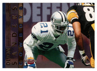 Deion Sanders - Dallas Cowboys (NFL Football Card) 1997 Score Board Playbook - Defense # 4 Mint