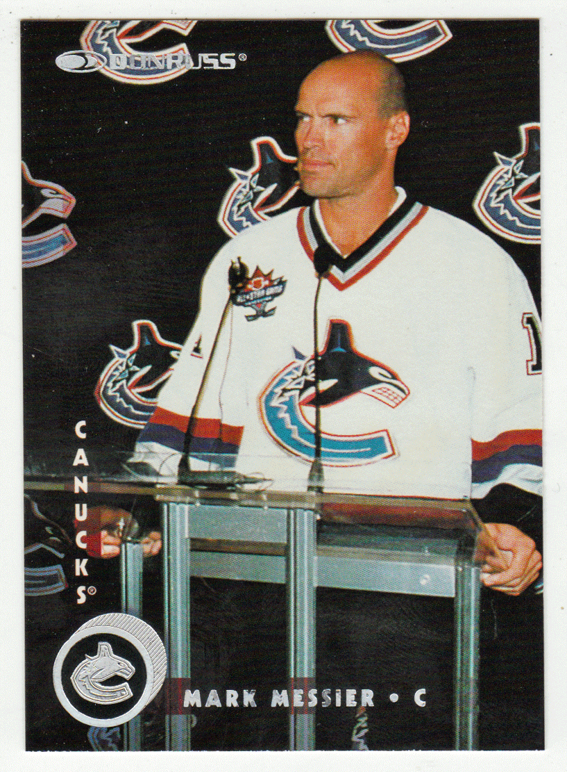 In Vancouver Canucks uniform, captain Mark Messier plays this season's  National Hockey League opener at Yoyogi Arena in Tokyo Saturday, Oct. 4,  1997. Vancouver Canucks and Anaheim Mighty Ducks play two-game opening